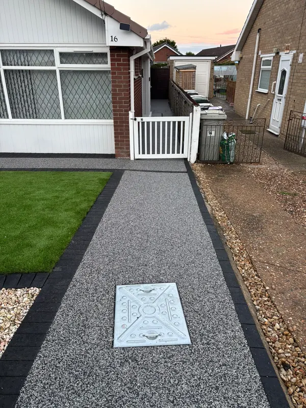 Grey resin path to a white gate