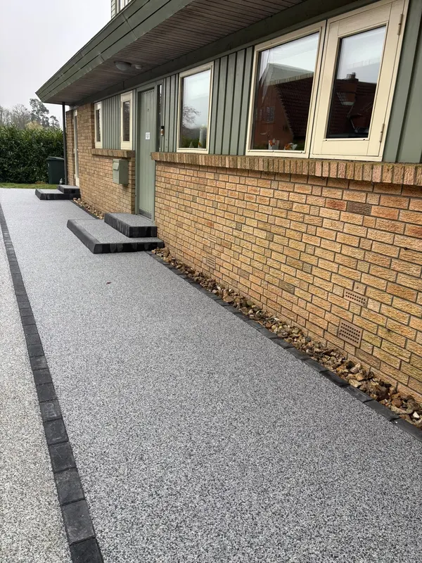 Grey resin bound driveway and frontage